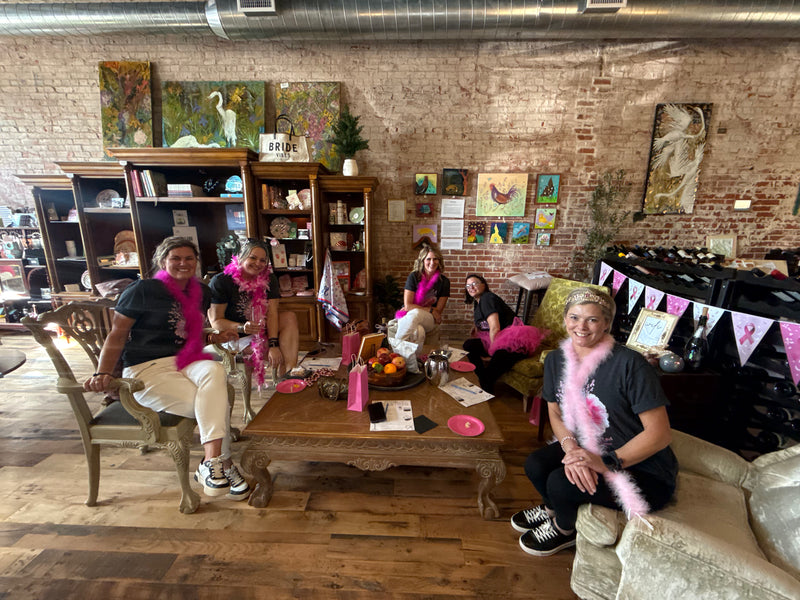 Group of people in a cozy room at the Sparkling Rosé Soirée